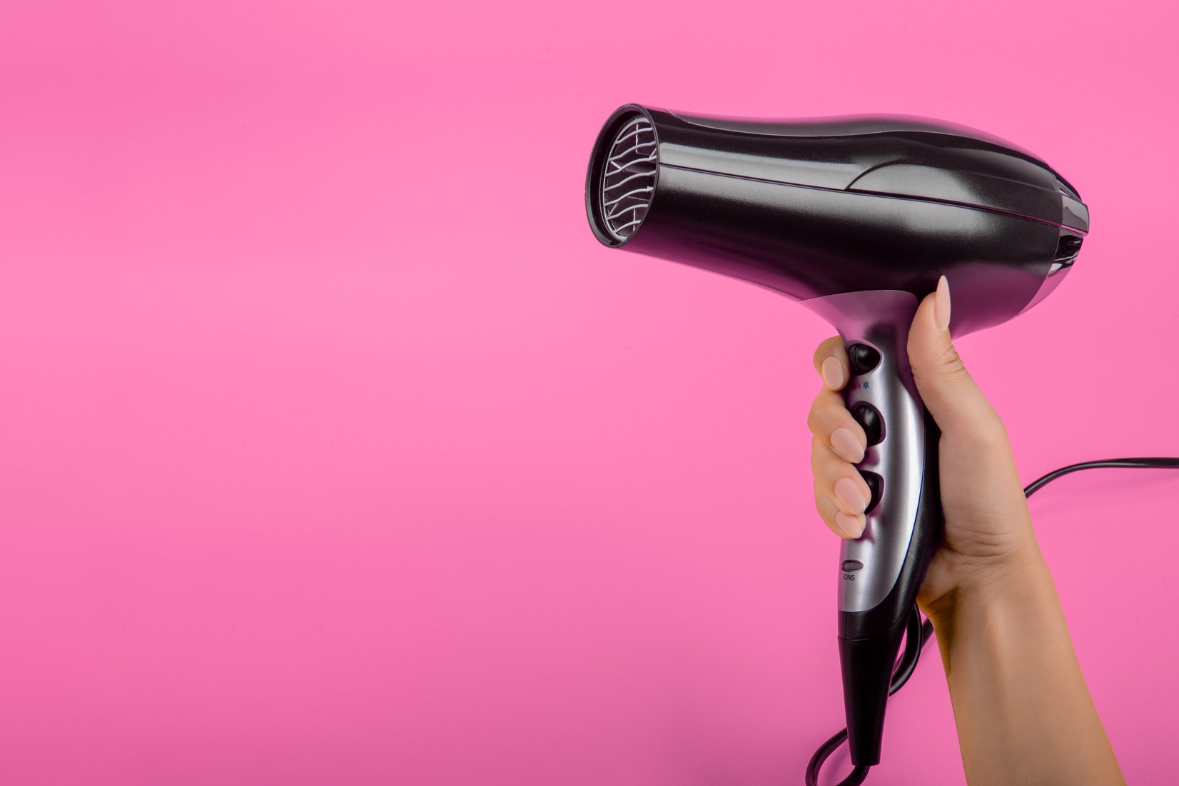 Hairdryer on Pink Background